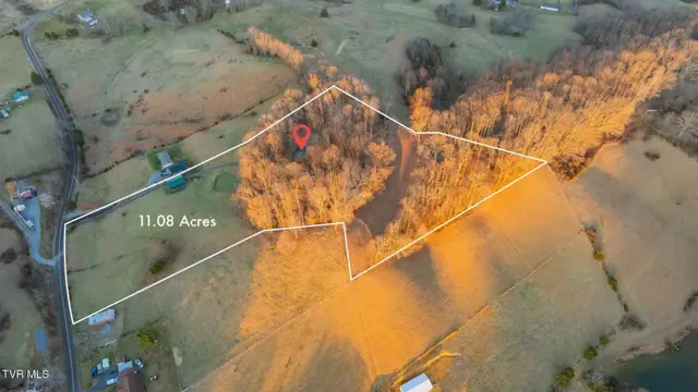 Aerial view of the property boundary, 11 acres of pasture and woods